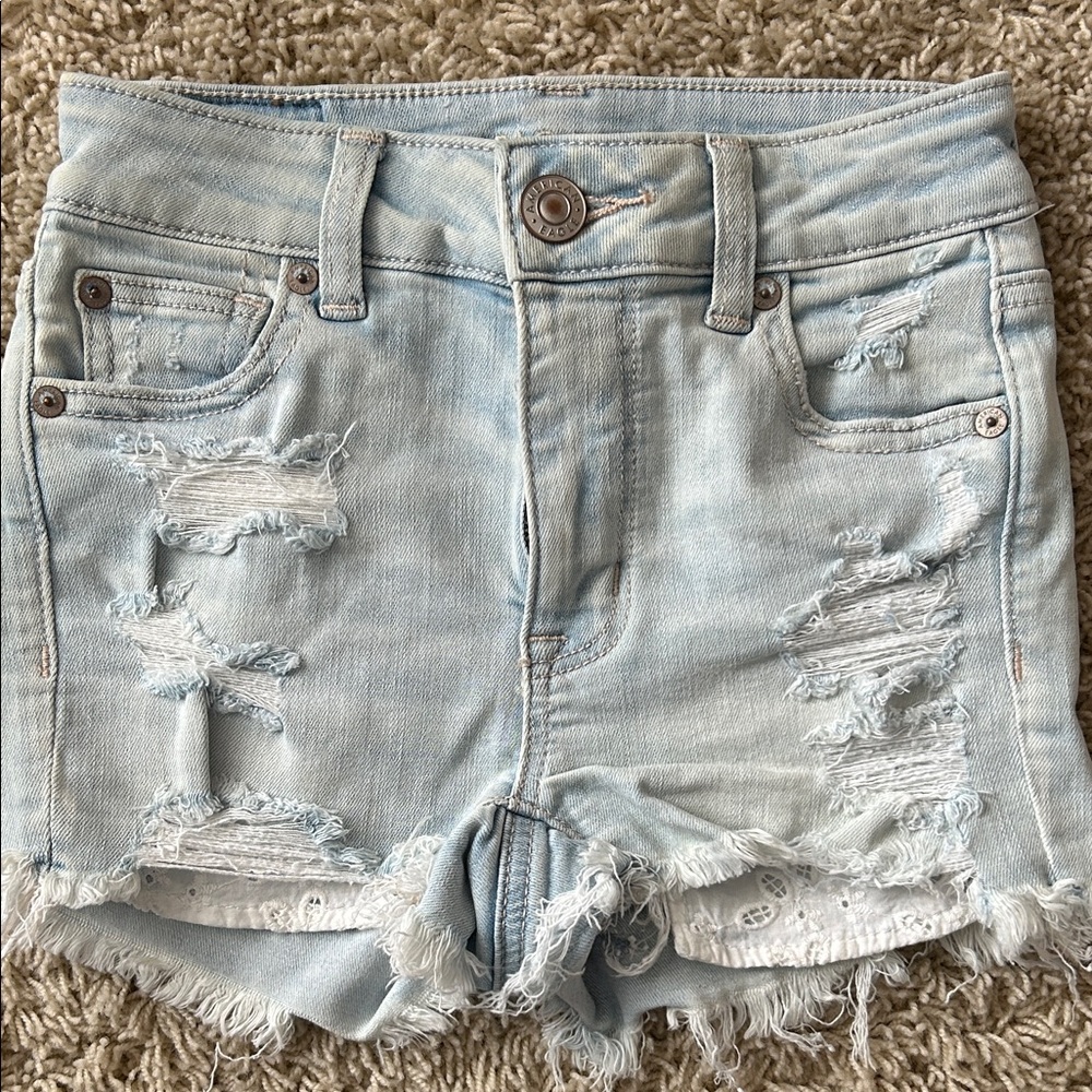 American Eagle Next Level Stretch Light Blue Distressed Denim Shorts Size 000